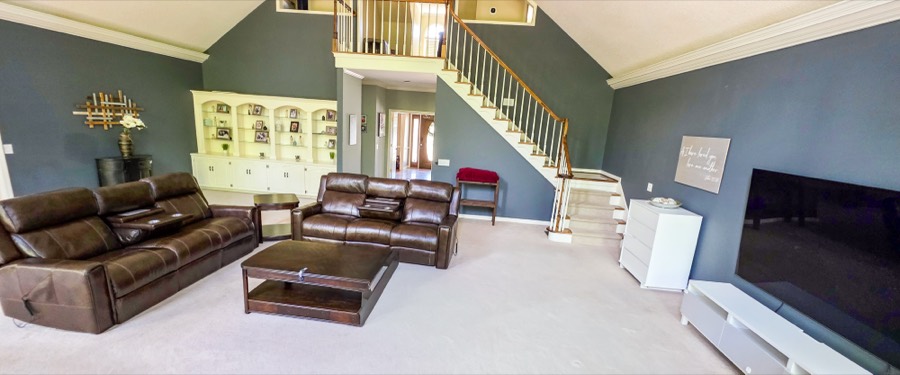 Main living room with 20-foot vaulted ceilings